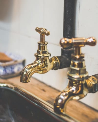 A close up of the faucet on a sink